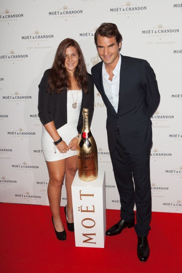 Marion Bartoli et Roger Federer lors des 270 ans de Moët & Chandon à New York le 20 août 2013.