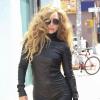Lady Gaga, tout de noir vêtue avec des lunettes Tom Ford, une combinaison en cuir Mila Schön et des bottines Azzedine Alaïa. New York, le 20 août 2013.