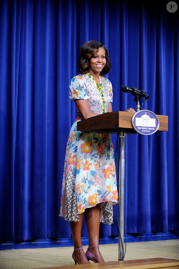 Michelle Obama a prononcé un discours avant la projection du documentaire "L'éminence grise : le combat de Whitney Young pour les droits civils" dans l'Auditorium de la Cour du Sud de l'Eisenhower Executive Office Building à côté de la Maison Blanche. Le 27 août 2013.