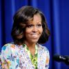 Michelle Obama a prononcé un discours avant la projection, face à des lycées, du documentaire "L'éminence grise : le combat de Whitney Young pour les droits civils" dans l'Auditorium de la Cour du Sud de l'Eisenhower Executive Office Building à côté de la Maison Blanche. Le 27 août 2013. 