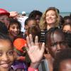Valérie Trierweiler, accompagne près de 5000 enfants parisiens à Cabourg, dans le cadre de "La journée des oubliés des vacances", organisée par le Secours Populaire le 28 août 2013.