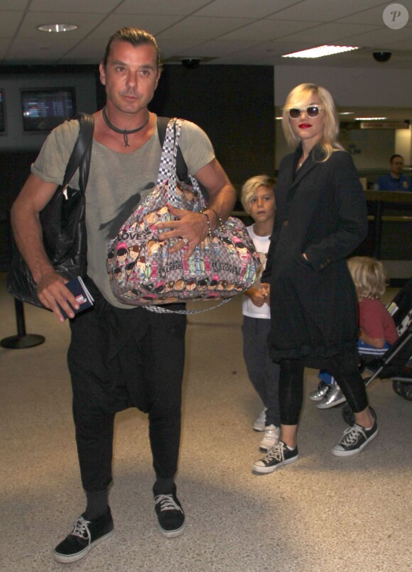 Gwen Stefani, son époux Gavin Rossdale et leurs deux enfants Kingston et Zuma arrivent à l'aéroport LAX de Los Angeles, en provenance de Londres. Le 23 août 2013.