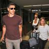 La chanteuse LeAnn Rimes et son mari Eddie Cibrian arrivent à l'aéroport LAX de Los Angeles pour prendre un avion. Le 27 août 2013.