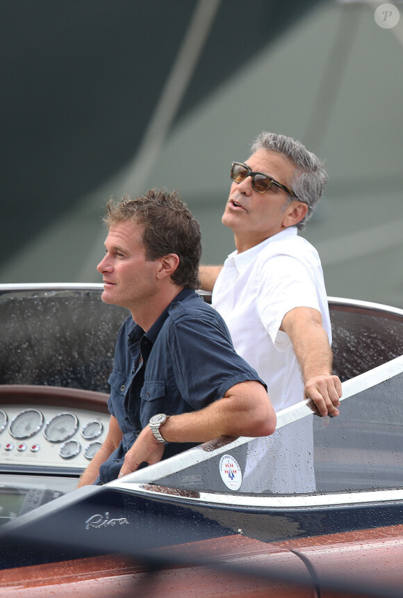 Exclusif - George Clooney et son ami Rande Gerber sur la côte d'Azur, à la villa d'Eze, le 19 août 2013.