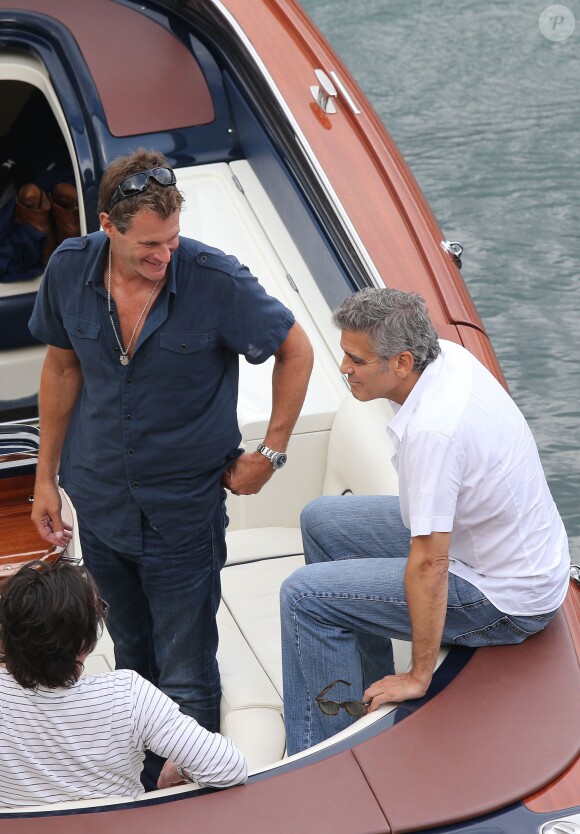 Exclusif - George Clooney et son ami Rande Gerber passent du bon temps en vacances, en balade en mer et détente chez Bono sur la côte d'Azur, à la villa d'Eze, le 19 août 2013.