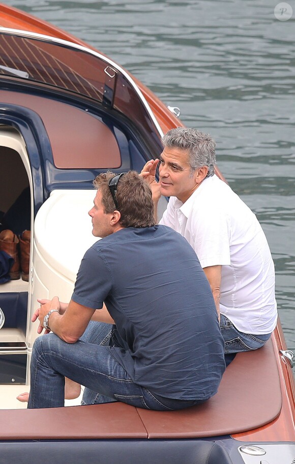 Exclusif - George Clooney et son ami Rande Gerber passent du bon temps en vacances, en balade en mer et détente chez Bono sur la côte d'Azur, à la villa d'Eze, le 19 août 2013.