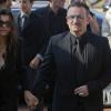 Bono et sa femme Alison Houston, assistent à la messe funèbre du poète irlandais Seamus Heaney à Dublin, le 2 septembre 2013.