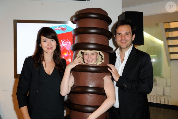Christophe Michalak et sa compagne Delphine McCarty assistent à la soirée Mikado King Choco au concept store Colette store, à Paris le 24 mai 2012.