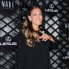 Sarah Jessica Parker, souriante et tout de noir vêtue avec une robe Giles et des souliers Gianvito Rossi, assiste à la soirée Lexus Design Disrupted au SIR Stage 37. New York, le 5 septembre 2013.