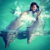 Jade réalise un rêve : nager avec les dauphins. Le 16 août sur l'île d'Anguilla.