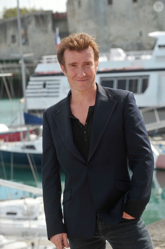 Thierry Frémont pose pour le photocall de la série 'Des Frères et des Soeurs' lors du 15e Festival de La Fiction Tv a La Rochelle le 13 Septembre 2013.