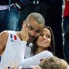 Tony Parker et sa fiancée Axelle après la finale de l'Eurobasket remportée par la France face à la Lituanie (80-66), à Ljubjana, le 22 septembre 2013