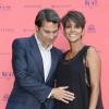 Olivier Martinez et Halle Berry enceinte lors du Champs-Elysées Film Festival 2013 à Paris le 13 juin 2013.