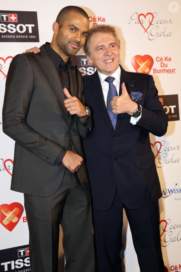 Tony Parker, Francois Thiebaud (Pdg du groupe Tissot) lors de la huitième édition du Par Coeur Gala qui se tenait à l'abbaye de Collonges le 26 septembre 2013