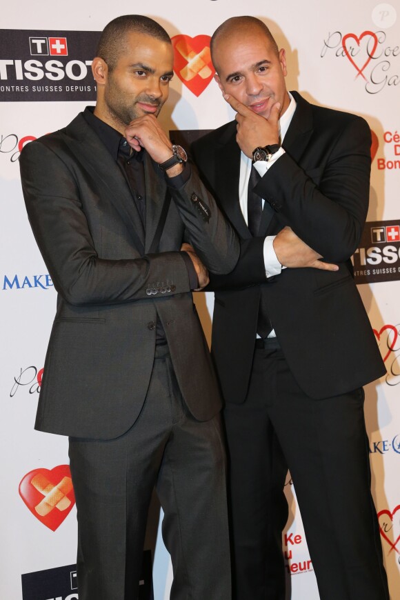 Tony Parker et DJ Cut Killer lors de la huitième édition du Par Coeur Gala qui se tenait à l'abbaye de Collonges le 26 septembre 2013