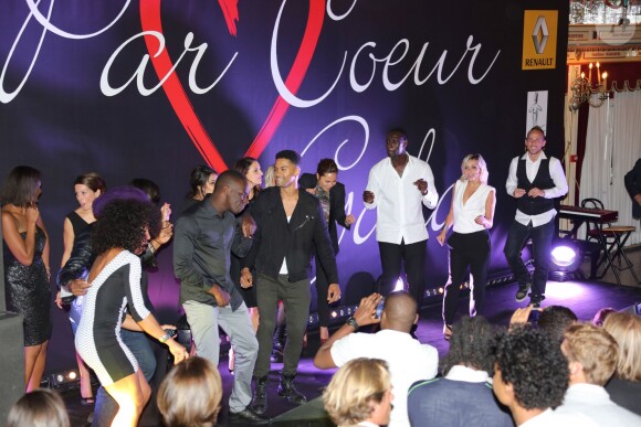 Omar Su et les invités du Par Coeur Gala lors de la huitième édition de cet événement, le 26 septembre 2013 à l'Abbaye de Collonges tenue par Paul Bocuse