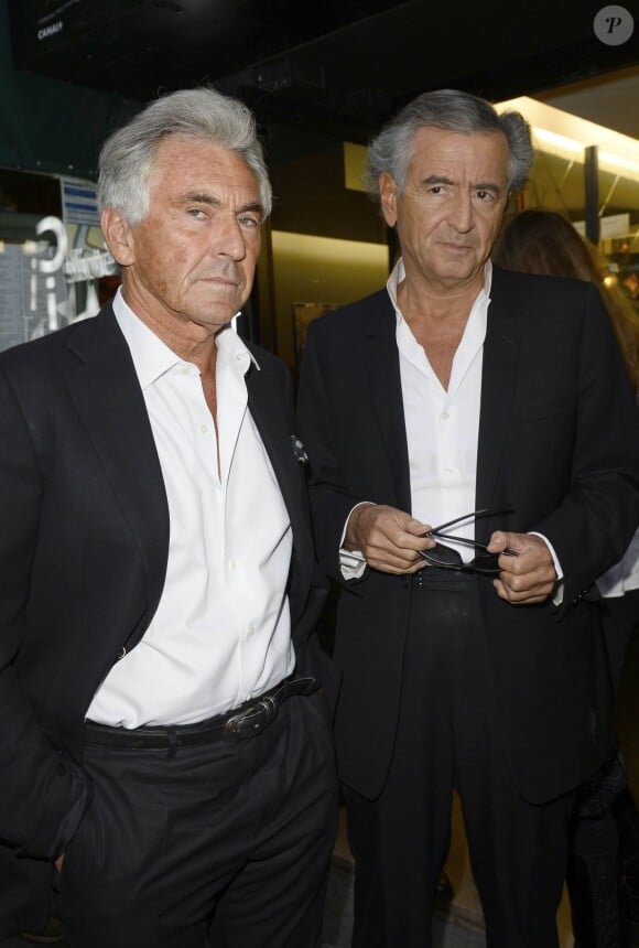 Jean-Paul Enthoven et Bernard-Henri Levy lors de la première du film "Opium" au cinéma Le Saint-Germain-des-Près à Paris, le 27 septembre 2013.