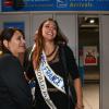 Marine Lorphelin retrouve avec bonheur sa mère Sandrine lorsqu'elle arrive à l'aéroport de Roissy Charles de Gaulle le 30 septembre, de retour de Bali où elle est arrivée première dauphine lors de l'élection Miss Monde 2013.