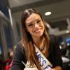 Marine Lorphelin, sublime, lorsqu'elle arrive à l'aéroport de Roissy Charles de Gaulle le 30 septembre, de retour de Bali où elle est arrivée première dauphine lors de l'élection Miss Monde 2013.