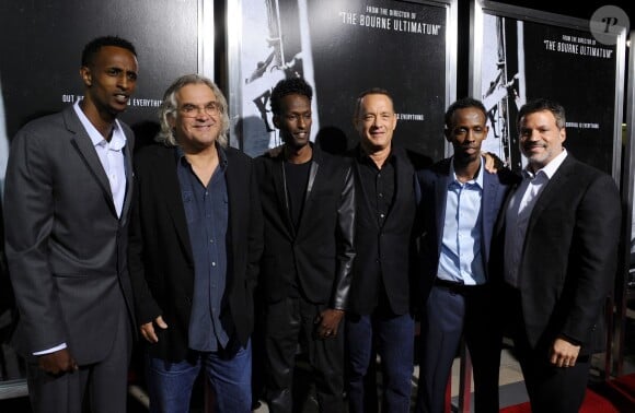 Faysal Ahmed, Paul Greengrass, Mahat M. Ali et Tom Hanks lors de l'avant-première du film Capitaine Phillips à Los Angeles le 30 septembre 2013