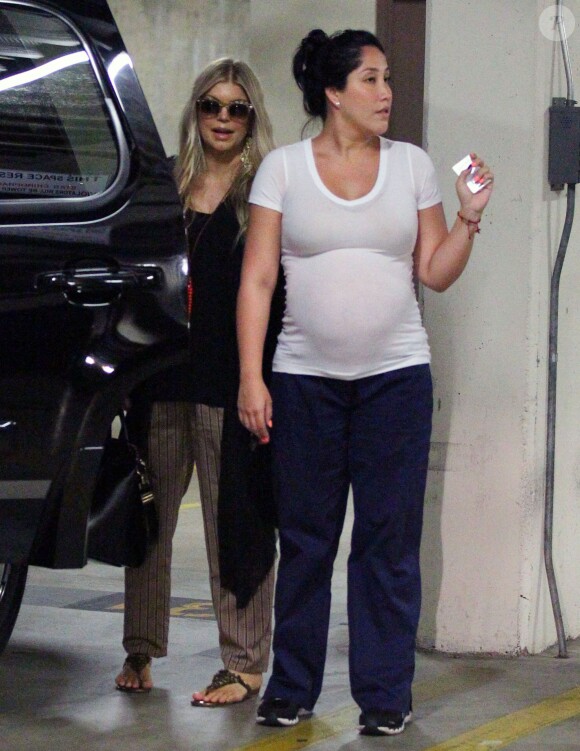 Fergie et Josh Duhamel emmènent leur fils Axl à l'hôpital à Santa Monica, le 3 octobre 2013.