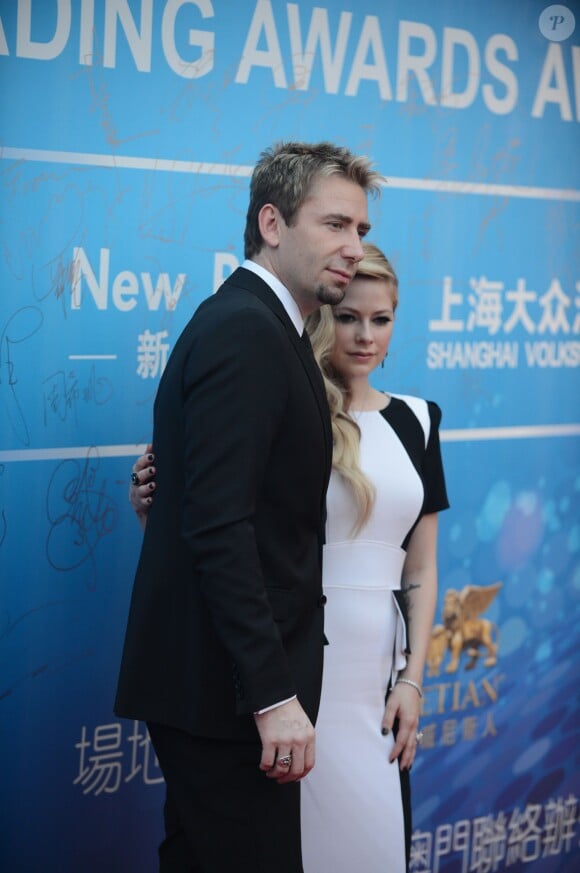 Avril Lavigne et son mari Chad Kroeger lors de la cérémonie des Huading Awards à Macao, le 7 octobre 2013.