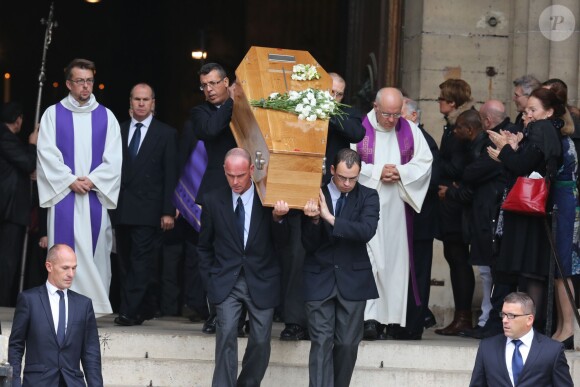 A la sortie des obsèques de Patrice Chéreau en l'Eglise Saint-Sulpice à Paris, le 16 octobre 2013.