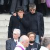 La famille très emue à la sortie des obsèques de Patrice Chéreau en l'Eglise Saint-Sulpice à Paris, le 16 octobre 2013.