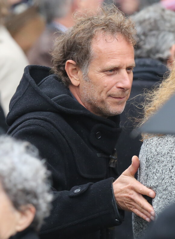 Charles Berling à la sortie des obsèques de Patrice Chéreau en l'Eglise Saint-Sulpice à Paris, le 16 octobre 2013.