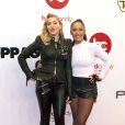 Madonna et sa coach Nicole Winhoffer - Ouverture du "Hard Candy Fitness" à Berlin, le 17 octobre 2013.