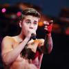 Justin Bieber, torse nu en concert à Pekin en Chine, le 29 septembre 2013.
