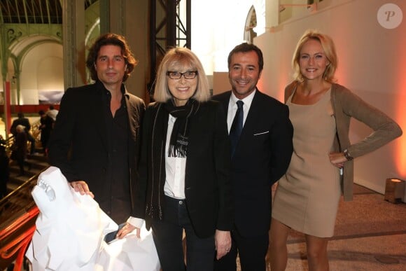 Richard Orlinski, Mireille Darc, Bernard Montiel et Alexandra Vandernoot lors de la soirée d'inauguration de la FIAC (Foire Internationale d'Art Contemporain) au Grand Palais à Paris le 23 octobre 2013