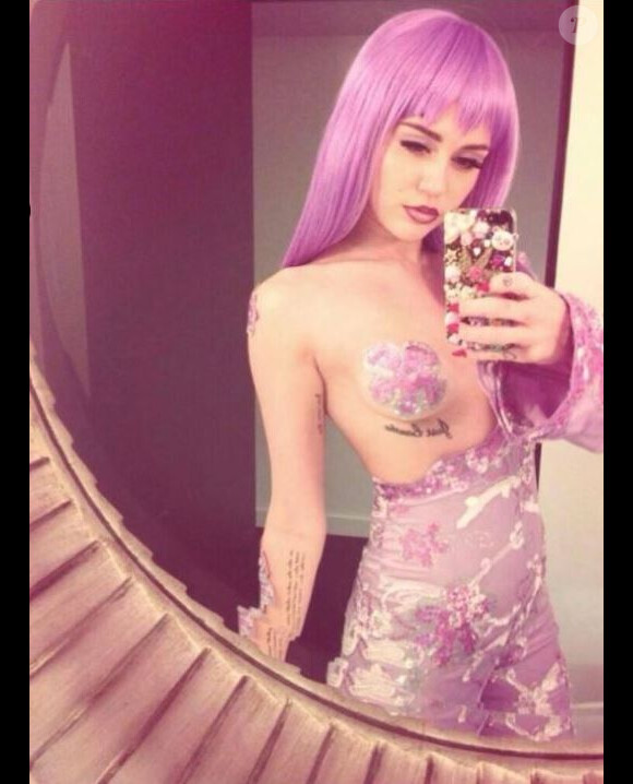 Miley Cyrus en Lil Kim pour Halloween 2013.