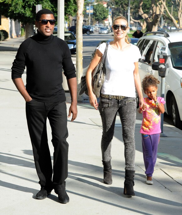 Le chanteur Babyface (de son vrai nom Kenneth Edmonds) Heidi Klum et sa fille Lou à Los Angeles, le 9 novembre 2013.