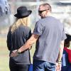 Heidi Klum et son conjoint Martin Kristen observent les enfants du top model lors de leur match de football. Los Angeles, le 10 novembre 2013.