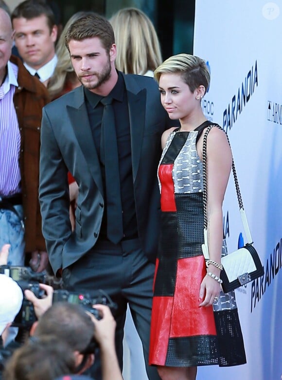 Miley Cyrus et son fiancé Liam Hemsworth à Los Angeles, le 8 août 2013.