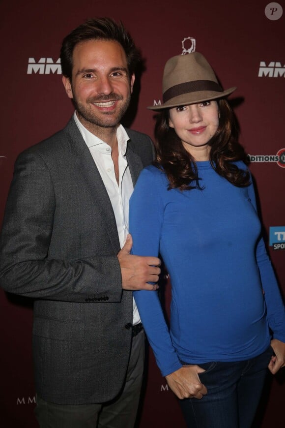 Exclusif - Christophe Michalak et sa femme Delphine McCarty enceinte lors d'une soirée à Paris, le 10 novembre 2013.