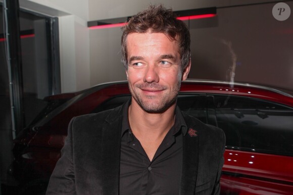 Sébastien Loeb à l'inauguration du premier DS World de Citroën à Paris, le 25 novembre 2013.