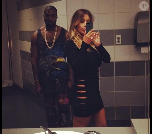 Kim Kardashian et Kanye West avant le concert du rappeur, le 30 novembre 2013 à Miami.