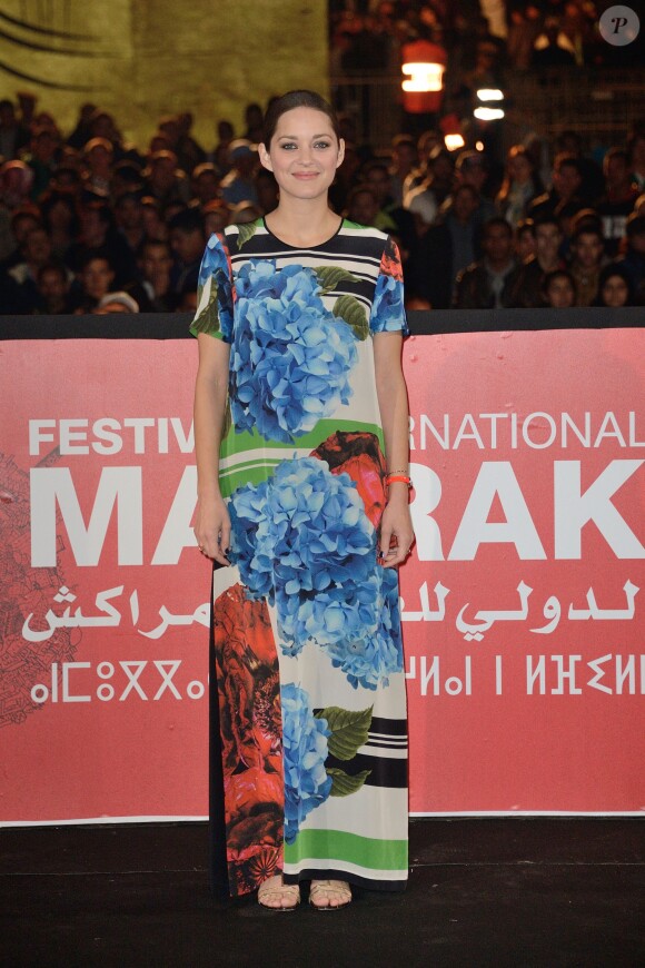 Marion Cotillard portant une robe Preen lors du Festival du film de Marrakech le 5 décembre 2013