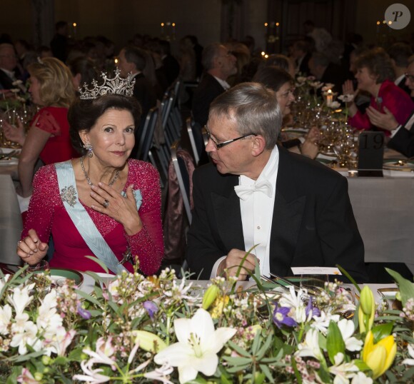 La reine Silvia de Suède et Carl-Henrik Heldin, président du conseil de la Fondation Nobel, au cours du banquet organisé en l'honneur des lauréats des Nobel 2013, à l'Hôtel de Ville de Stockholm le 10 décembre 2013
