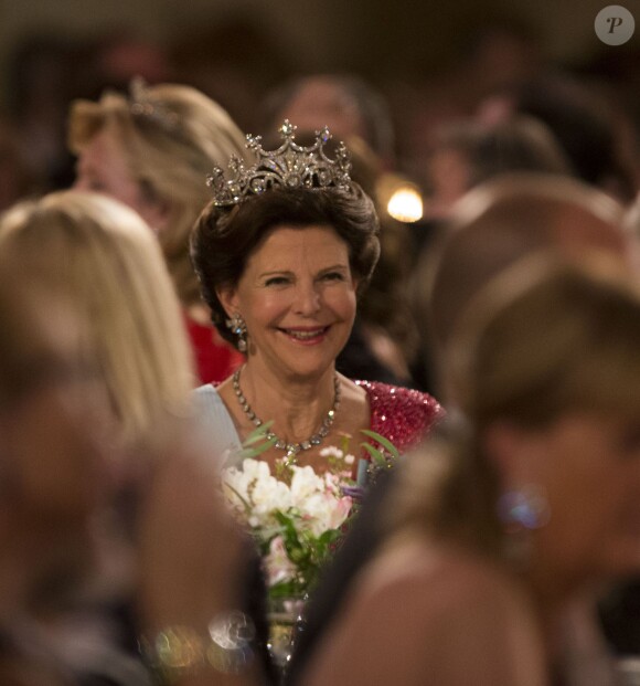 La reine Silvia de Suède au cours du banquet organisé en l'honneur des lauréats des Nobel 2013, à l'Hôtel de Ville de Stockholm le 10 décembre 2013