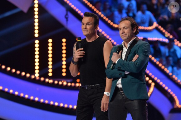 Richard Virenque et Philippe Candeloro, durant le troisième prime d'Ice Show sur M6 à Paris, le 11 décembre 2013.