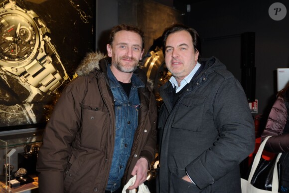 David Zmirov et Jean-Paul Rouve lors de l'inauguration de la nouvelle boutique G-Shock à Paris le 12 décembre 2013.