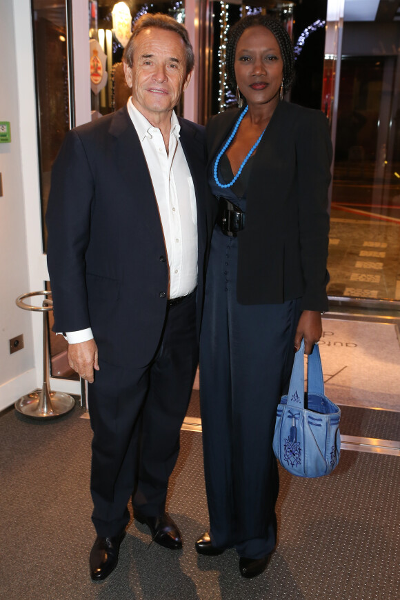 Jacky Ickx et sa femme Khadja Nin, lors de l'avant-première du documentaire "Week-End of a Champion" de Roman Polanski au Grimaldi Forum à Monaco, le 16 décembre 2013.