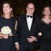 Charlotte Casiraghi, enceinte et rayonnante, avec le prince Albert et la princesse Caroline lors d'une soirée caritative à la Villa Paloma à Monaco le 17 septembre 2013