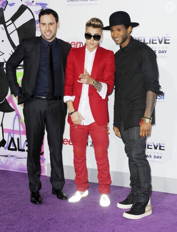 Justin Bieber, Usher et Scooter Braun à l'avant-première du film "Believe" à Los Angeles, le 18 décembre 2013.