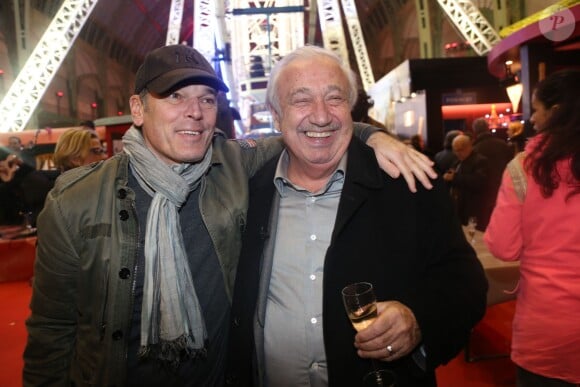 Laurent Baffie et Marcel Campion à la soirée d'inauguration de "Jours de Fêtes" au Grand Palais à Paris, organisée par Marcel Campion, le 19 décembre 2013.