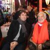 Fabrice Santoro et Jean-Paul Belmondo à la soirée d'inauguration de "Jours de Fêtes" au Grand Palais à Paris, organisée par Marcel Campion, le 19 décembre 2013.
