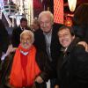 Jean-Luc Reichmann, Marcel Campion et Jean-Paul Belmondo à la soirée d'inauguration de "Jours de Fêtes" au Grand Palais à Paris, organisée par Marcel Campion, le 19 décembre 2013.